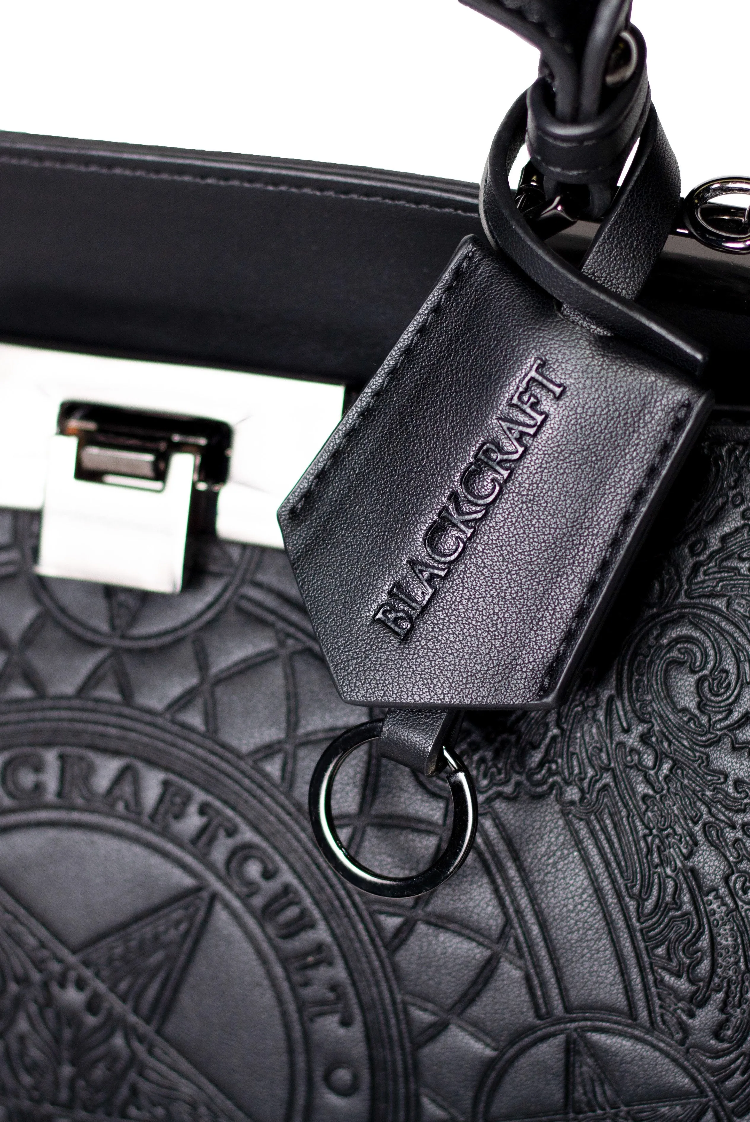 Baroque top handle black goat purse