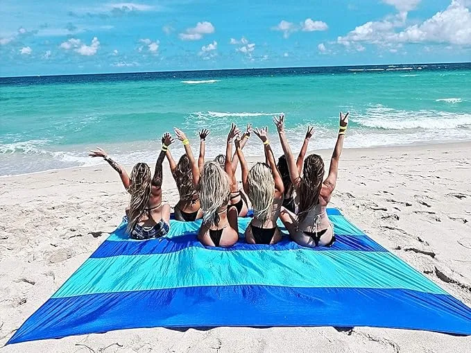 Premium XXL Beach Blanket Sandproof Water Resistant Quick Dry Mat 10ft by 9ft for 1-8 Adults with 4 Metal Stakes, 4 Corner Pockets, Secure Clip and Strap, and Attached Bag